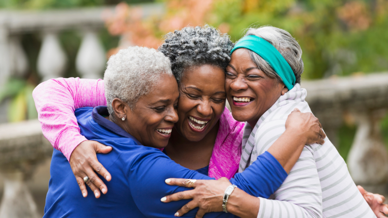 100 Questions to Ask the Elderly - 3 woman hugging and smiling