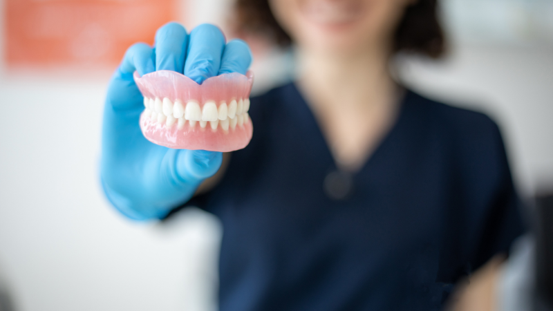 Dental Implants vs Dentures - Dentures