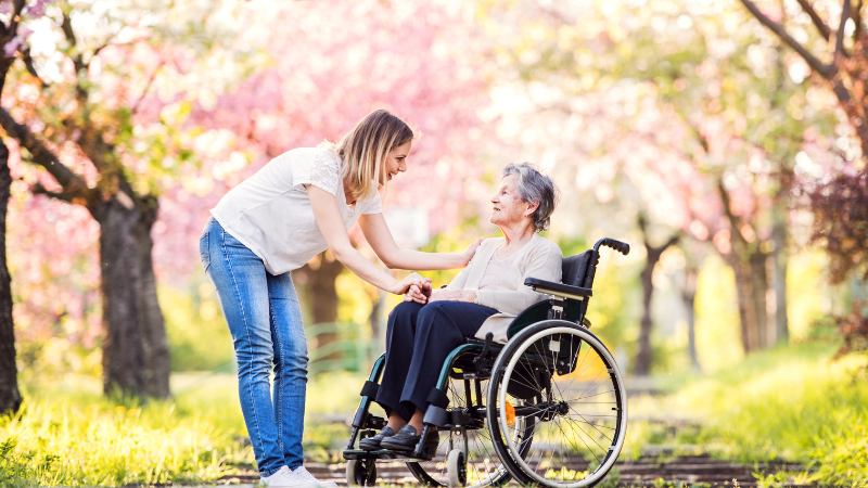 How to Choose the Best Wheelchair for Elderly Seniors - woman with mother in wheelchair