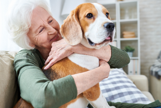 Preparing-For-Surgery-Checklist- Woman hugging dog.