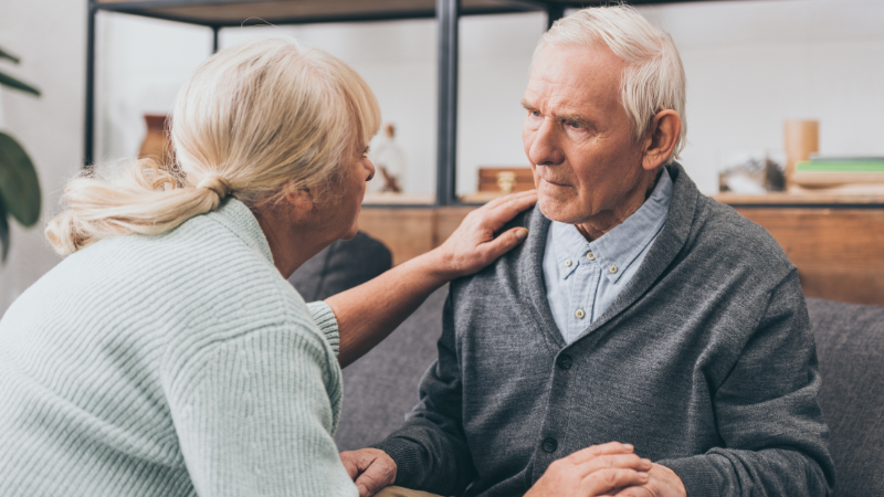 When to Call Hospice for Dementia - older man looking confused at his wife.